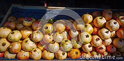 Ripe group pomegranate fruit on market in Morocco Stock Photo