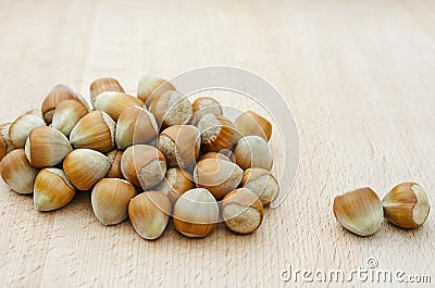 Ripe hazelnuts scattered on the table 4 Stock Photo