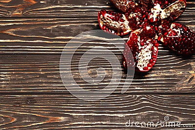 Pomegranate on wooden background Stock Photo