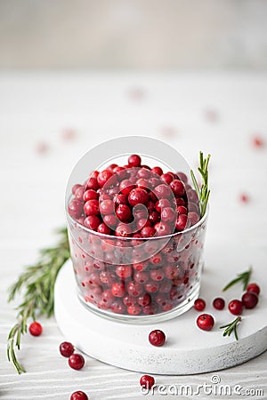 ripe lingonberries in a glass bowl Stock Photo