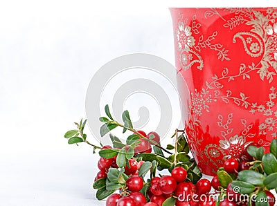 Ripe lingonberries and red cup with ornament Stock Photo