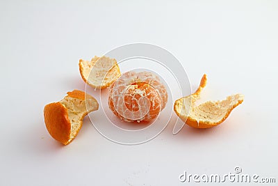 Ripe mandarin with leaves close-up on a white background. Stock Photo