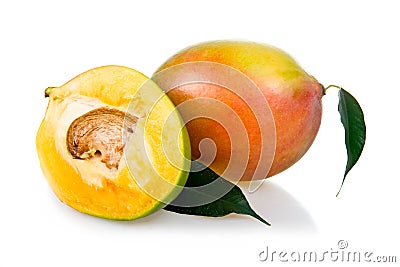 Ripe mango fruits with leaves isolated Stock Photo