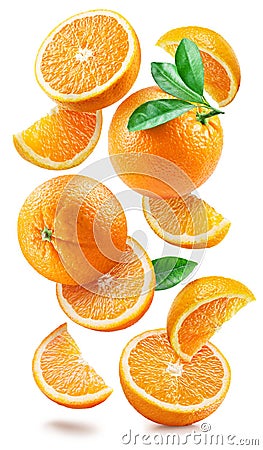 Ripe oranges with halves and slices with orange tree leaves randomly fall or levitate on a white background Stock Photo