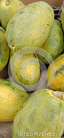 Ripe papaya fruit is usually used as a condiment and facilitates defecation Stock Photo