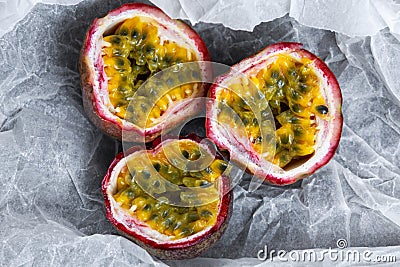 Ripe passion fruit on a crumpled paper Stock Photo