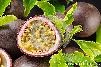 Ripe passion fruits with passion fruit seeds Stock Photo