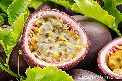 Ripe passion fruits with passion fruit seeds. Stock Photo