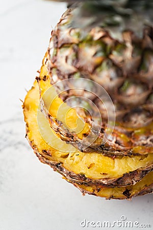 pineapple cut into pieces. top view. Shallow depth of field. Close up Stock Photo
