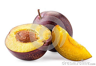 Ripe plum, half pitted and slice on white background. Isolated. Stock Photo