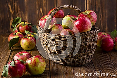 Ripe red apples in a basket Stock Photo