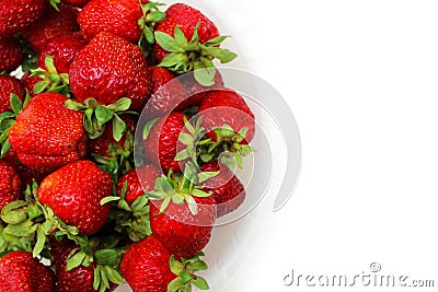 Ripe red strawberries in a dish on a white Stock Photo