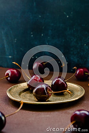Ripe tasty berries of a sweet cherry closeup. Still life, preparation for advertising natural juice. Copy space Stock Photo