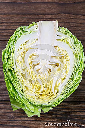 Ripe white cabbage on a wooden table. Top views, close-up Stock Photo