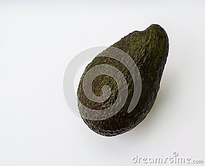 Ripe whole avocado on white background Stock Photo
