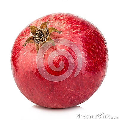 Ripe whole pomegranate close-up isolated on a white background. Stock Photo