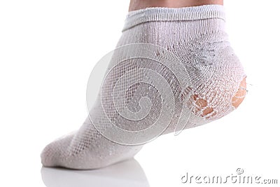 Ripped white sock on male leg isolated Stock Photo