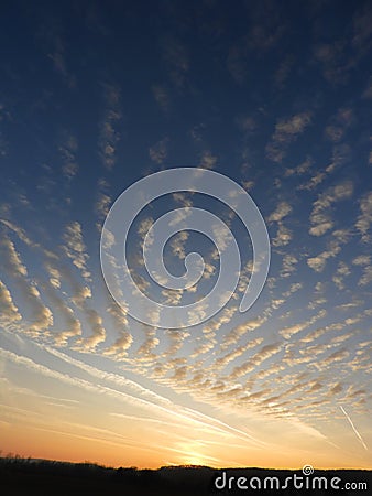 Ripple clouds form during Fingerlakes winter sunset Stock Photo