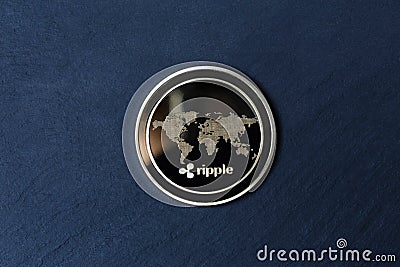 Ripple coin on a slate plate background Editorial Stock Photo