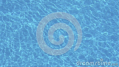 Ripple Water in swimming pool with sun reflection Stock Photo