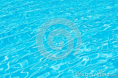 Ripple Water in swimming pool with sun reflection. Stock Photo