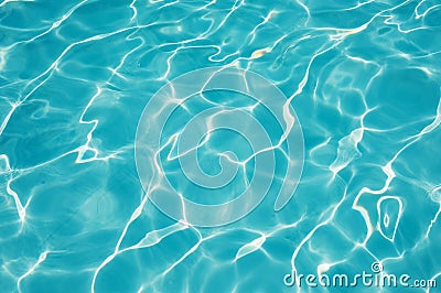 Ripple Water in swimming pool witn sun reflection Stock Photo