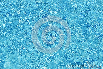 Rippled pattern of clean water in a blue swimming pool Stock Photo