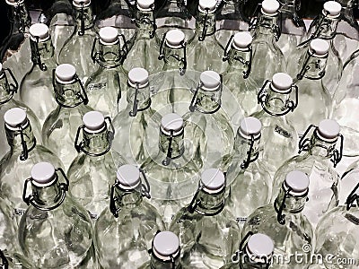 RISHON LE ZION, ISRAEL- DECEMBER 16, 2017: Bouquet from transparent glass bottles. Soft focus. Many bottles Editorial Stock Photo