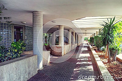 Multi-entrance residential quarters long walking passage under s Editorial Stock Photo