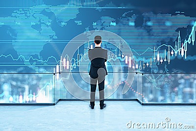 Rising quotes in stock market concept with businessman looking at digital wall screen with global forex chart Stock Photo