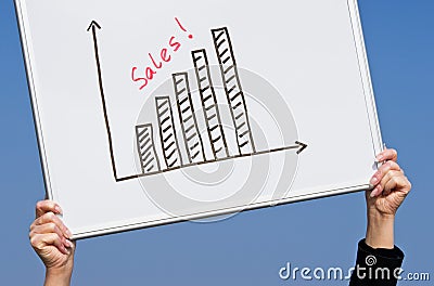 Rising sales graph Stock Photo