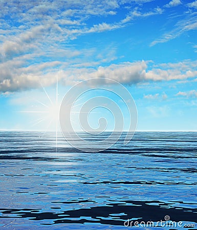 Rising Sun over a Ocean Landscape Stock Photo