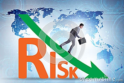 Risk reduction and mitigation concept with businessman Stock Photo