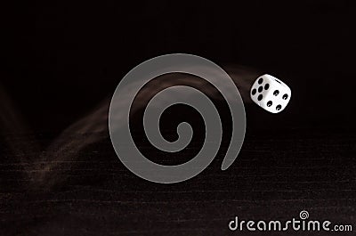 Risking All on a Roll of the Die Stock Photo