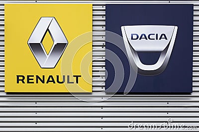 Renault and Dacia logos on a wall Editorial Stock Photo