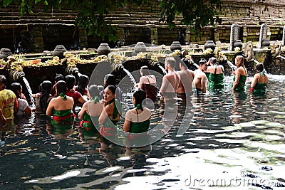 Ritual purifying bath. Tirta Empul. Tampaksiring. Gianyar regency. Bali. Indonesia Editorial Stock Photo