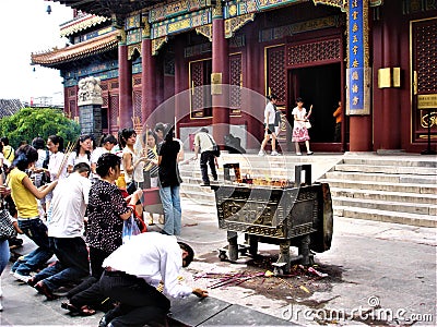 Ritual and religion, incense and fire, temple and worship in China Editorial Stock Photo