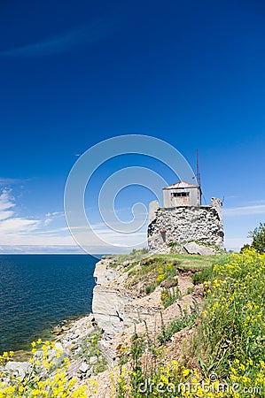 Riuned building of old Pakri lighthouse at breakage Stock Photo