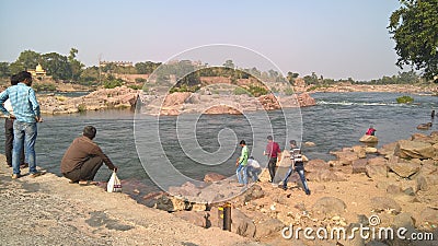 The river picnic spot tample boys Editorial Stock Photo