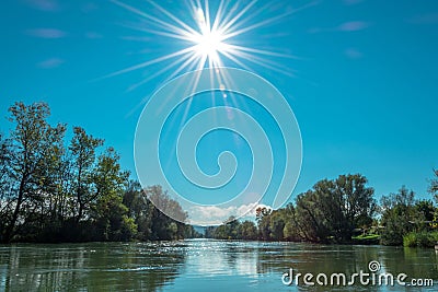 River bathed by the sunlight Stock Photo