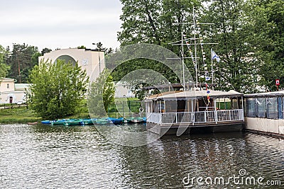 River boat at the pier in the recreation park Editorial Stock Photo