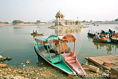 River boats on Gadsisar Lake in India Editorial Stock Photo