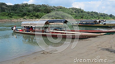 River Boats on the river between Guatamala and Mexico Editorial Stock Photo