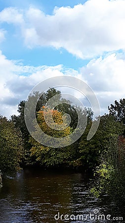 The River Calder from the bridge across it in Padiham own Centre. This river powered 20 cotton weaving Mills in 1906,all Stock Photo