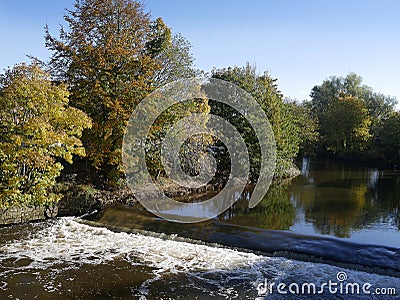 The River Calder from the bridge across it in Padiham Town Centre. Stock Photo