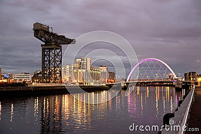 River Clyde, Glasgow, Scotland, UK, September 2013, the historic Finneston Crane and Clyde Arc Bridge Editorial Stock Photo