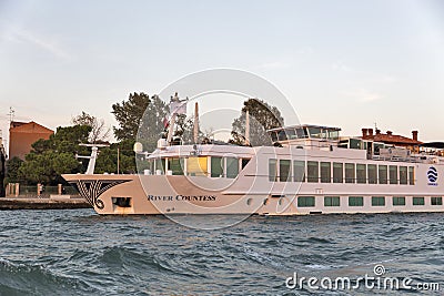 River Countess luxury passenger ship in Venice lagoon, Italy. Editorial Stock Photo