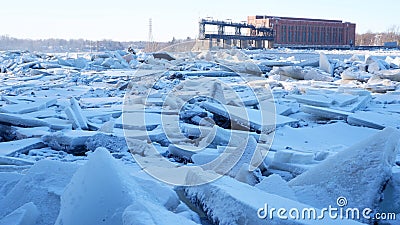 River covered with piles of ice smithereens Stock Photo