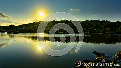 Sun reflected on a river, Feira de Santana, Bahia, Brazil Stock Photo