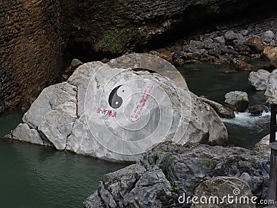 The river in Enshi China Grand Canyon with Taoism Symbol on the Stock Photo